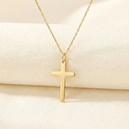 Gold cross necklace. 